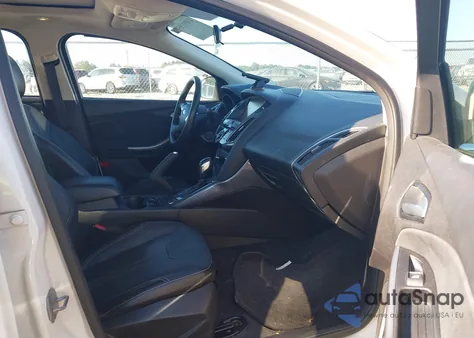 2014 Ford Focus Titanium from USA, damaged, VIN 1FADP3N2XEL190586